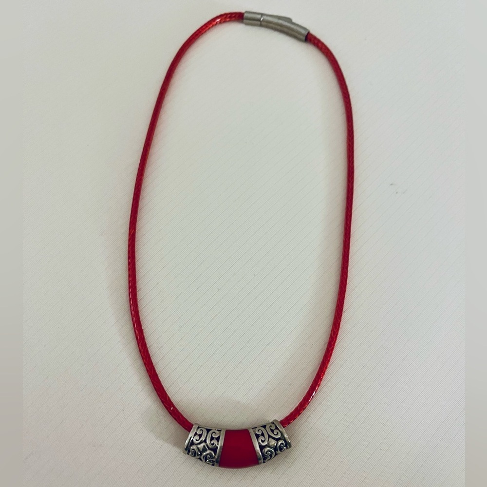 Sterling silver & leather chord necklace with Celtic pendant